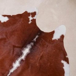 Natural Cowhide Brown and White 5 ft. x 7 ft. Animal Shape Area Rug by Home Decorators Collection -Zamma Home Decorators Shop brown and white home decorators collection area rugs v301000001brwh 1d 1000