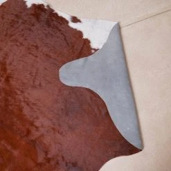 Natural Cowhide Brown and White 5 ft. x 7 ft. Animal Shape Area Rug by Home Decorators Collection -Zamma Home Decorators Shop brown and white home decorators collection area rugs v301000001brwh 66 1000