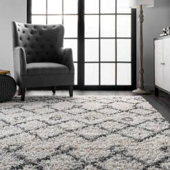 Transitional Kristi Shag Ivory 10 ft. x 14 ft. Indoor Area Rug by Home Decorators Collection 12 Transitional Kristi Shag Ivory 10 ft. x 14 ft. Indoor Area Rug by Home Decorators Collection -Zamma Home Decorators Shop ivory home decorators collection area rugs kkel02a 10014 c3 1000